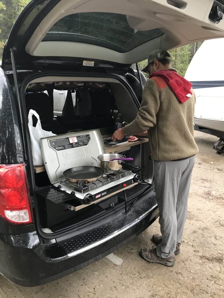 Mr. Taco Cooking a Meal Out of the Back of a Van